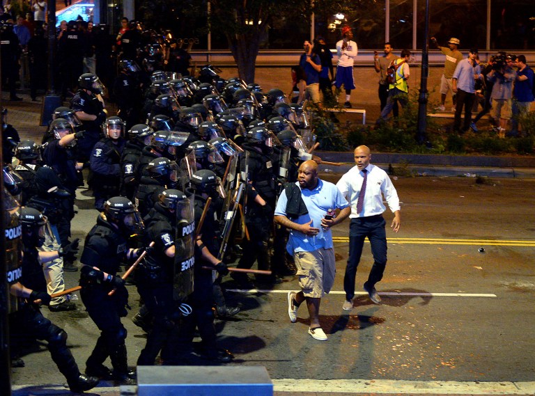 African-American man was shot by a fellow civilian during protests Wednesday night.(Jeff Siner/The Charlotte Observer via AP)