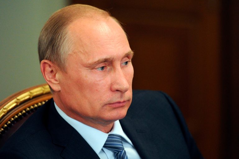 Russian President Vladimir Putin listens during a meeting Tuesday. (AP Photo/RIA Novosti Kremlin, Mikhail Klimentyev, Presidential Press Service)