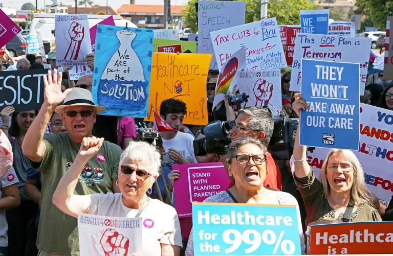 Doctors, nurses and patients who will lose access to health care or see costs rise attend a rally against GOP health care proposals at Harbor-UCLA Medical Center in Torrance, Calif. (AP Photo/Reed Saxon)