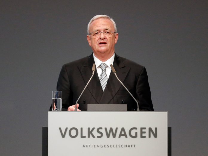 Volkswagen CEO Martin Winterkorn addresses the shareholders during the annual shareholder meeting of the car manufacturer Volkswagen in Hannover, Germany. Winterkorn on Wednesday, Sept. 23, 2015 said he is stepping down "in the interests of the company" as it grapples with the scandal over Volkswagen's evasion of U.S. emissions controls. (AP Photo/Frank Augstein, File)