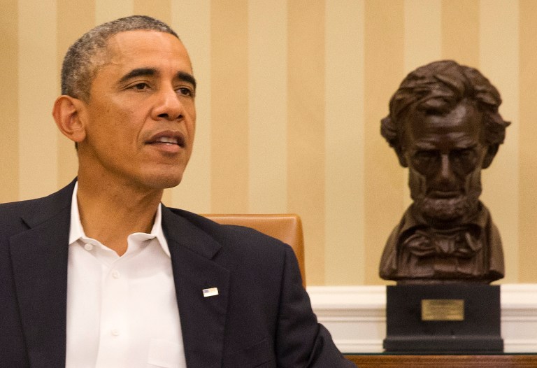 President Barack Obama meets with members of his public health and national security team about the response to the diagnosis of a second Ebola case in Dallas, Texas, Monday, Oct. 13, 2014, in the Oval Office of the White House in Washington. (AP Photo/Jacquelyn Martin)