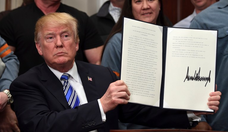 President Trump on Thursday signed two proclamations declaring tariffs on steel and aluminum. (AP Photo/Susan Walsh)