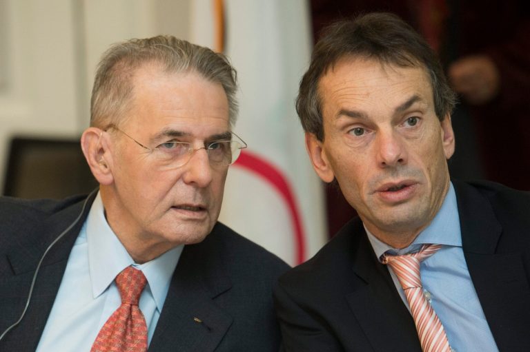   President of the International Olympic Committee, IOC, Jacques Rogge from Belgium, left, and IOC Director General Christophe De Kepper, from Belgium right, share a word prior to the opening of the IOC executive board's meeting, in Lausanne, Switzerland, Tuesday, Dec. 4, 2012. (AP Photo/Keystone, Jean-Christophe Bott)  