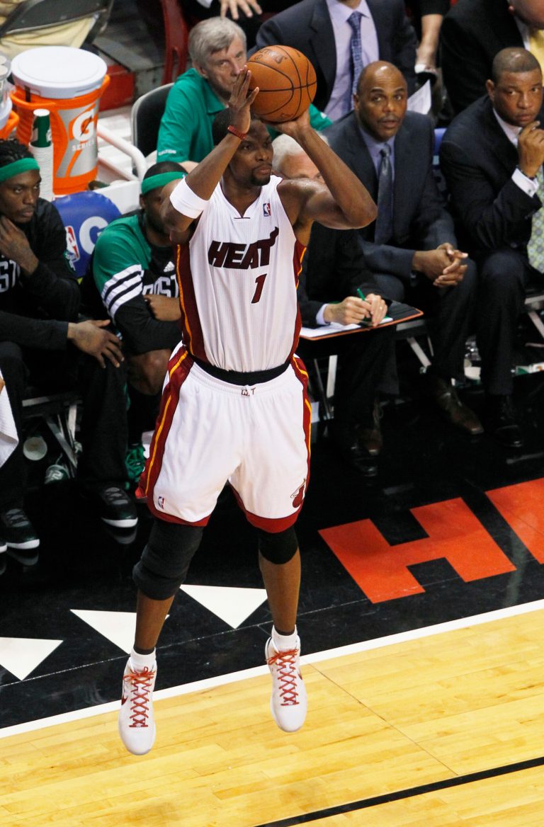   Miami Heat's Chris Bosh (1) goes up for a 3-pointer during the fourth quarter in Game 7 of the NBA basketball playoffs Eastern Conference finals against the Boston Celtics, Saturday, June 9, 2012, in Miami. The Heat defeated the Celtics 101-88. (AP Photo/Wilfredo Lee)  