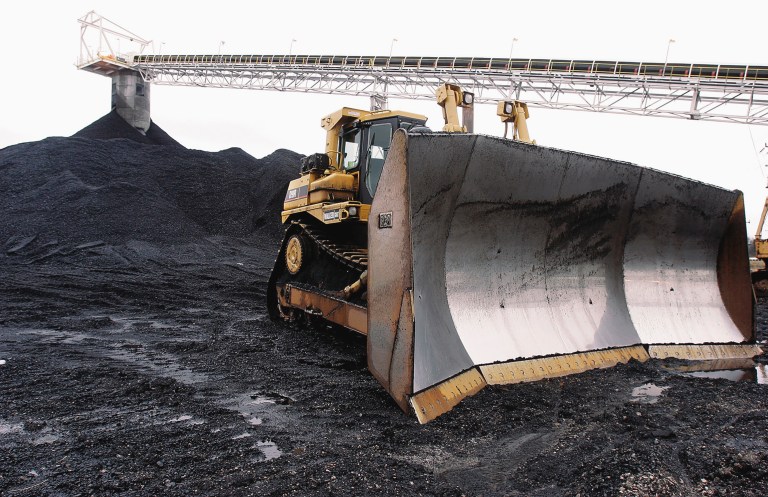 Low coal prices are eating away at Peabody Energy, the company said in a regulatory filing. (AP Photo/Seth Perlman, File)
