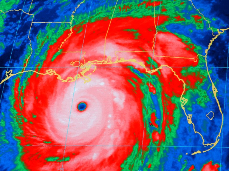 A National Oceanic and Atmospheric Administration infrared satellite Images shows the outer bands of Hurricane Katrina, well ashore on the northern Gulf coast and the center of the storm about 165 miles, south-southeast of New Orleans on Sunday, Aug. 28, 2005. (AP Photo/NOAA)