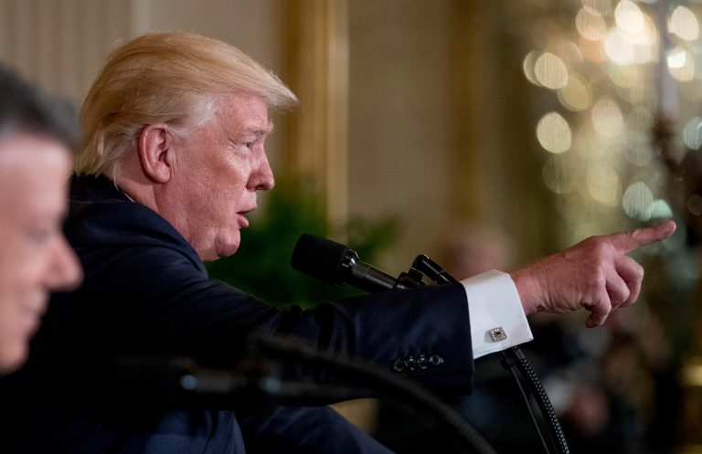 President Donald Trump accompanied by Colombian President Juan Manuel Santos, left, calls on a member of the media during a news conference in the East Room of the White House, Thursday, May 18, 2017, in Washington. (AP Photo/Andrew Harnik)