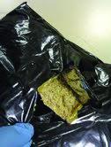 Heroin smuggler caught at airport pleads guilty