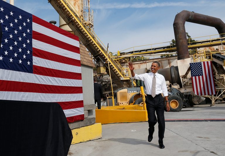 President Obama waves as he arrives to speak about the government shutdown and debt ceiling during a visit to M. Luis Construction on Thursday in Rockville, Md. (AP Photo/Charles Dharapak)