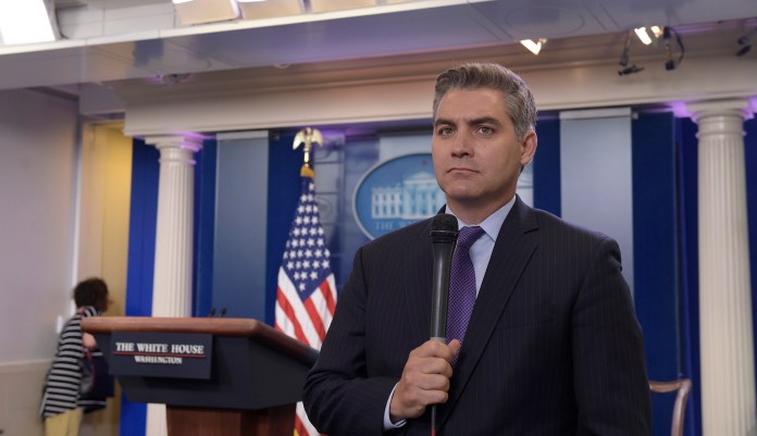 CNN's Jim Acosta said that White House aides "shouted in my face to drown out my questions." He added, "What occurred reminded me of something I would see in a different country. Certainly not at the WH. Certainly not in the U.S." (AP Photo/Susan Walsh)