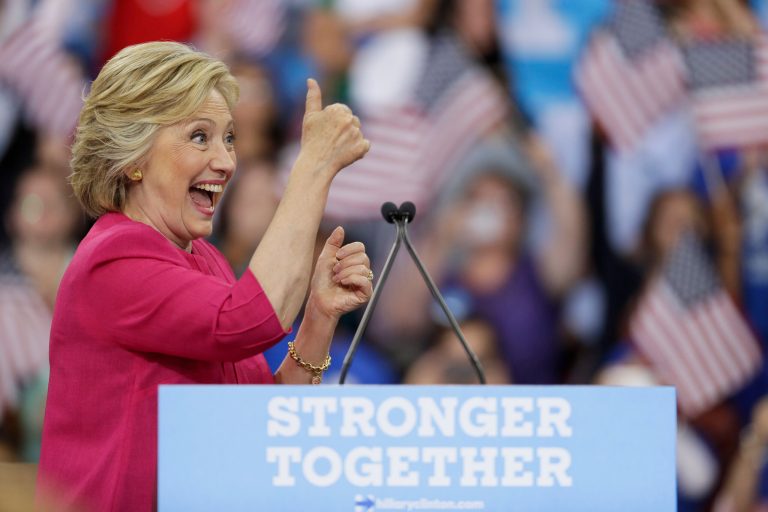 "But contrary to Donald Trump, I believe every time we knock down a barrier in America, it liberates everyone," Hillary Clinton said. (AP Photo)