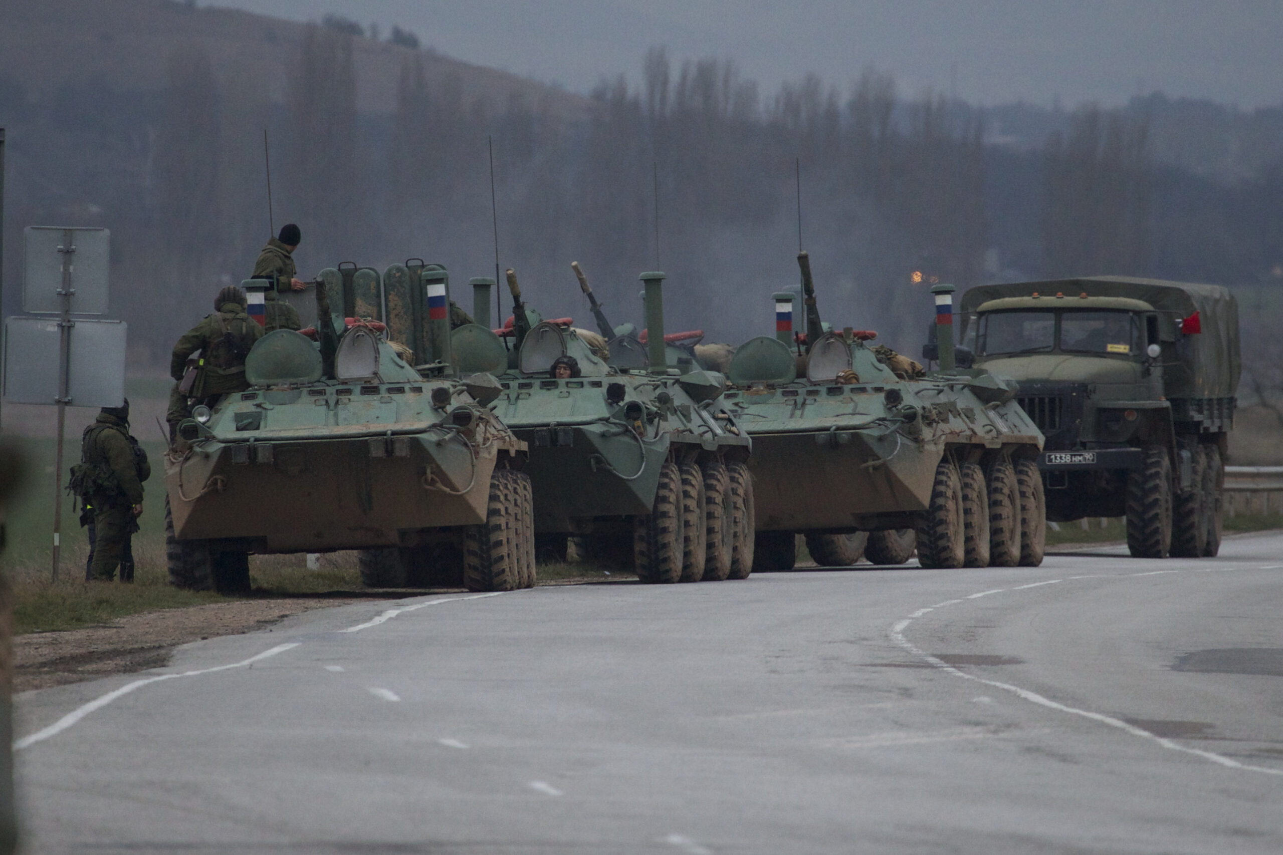 Ukraine says Russia tries to seize airports, base