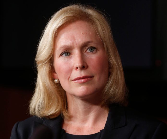 FILE - This July 16, 2013 file photo shows Sen. Kirsten Gillibrand, D-N.Y. listening at a news conference about a bill regarding military sexual assault cases on Capitol Hill in Washington. This week, the Senate is slated to consider an annual defense policy bill that would strip commanders of their ability to overturn jury convictions, require dishonorable discharge or dismissal for any individual convicted of sexual assault and establish a civilian review when a decision is made not to prosecute a case. The bill also would provide a special counsel for victims and eliminate the statute of limitations. (AP Photo/Charles Dharapak, File)