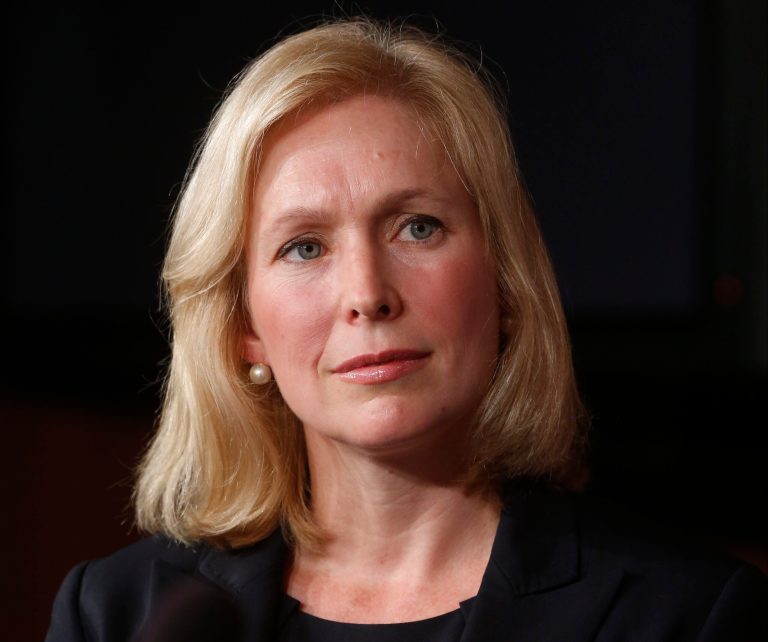 FILE - This July 16, 2013 file photo shows Sen. Kirsten Gillibrand, D-N.Y. listening at a news conference about a bill regarding military sexual assault cases on Capitol Hill in Washington. This week, the Senate is slated to consider an annual defense policy bill that would strip commanders of their ability to overturn jury convictions, require dishonorable discharge or dismissal for any individual convicted of sexual assault and establish a civilian review when a decision is made not to prosecute a case. The bill also would provide a special counsel for victims and eliminate the statute of limitations. (AP Photo/Charles Dharapak, File)