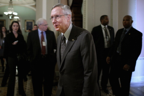 WASHINGTON, DC - DECEMBER 11:  Senate Majority Leader Harry Reid (D-NV) walks out of his party's weekly policy luncheon before talking to reporters at the U.S. Capitol December 11, 2012 in Washington, DC. R(Photo by Chip Somodevilla/Getty Images)