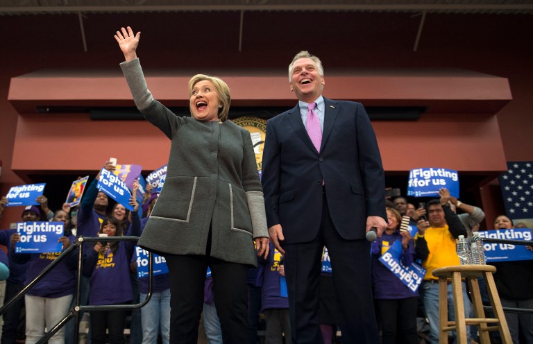 Virginia Governor Terry McAuliffe's deep ties to the Clintons could pose a liability to Hillary Clinton's presidential campaign as she struggles to shake the perception that she is a corrupt political insider. (AP Photo/Molly Riley)