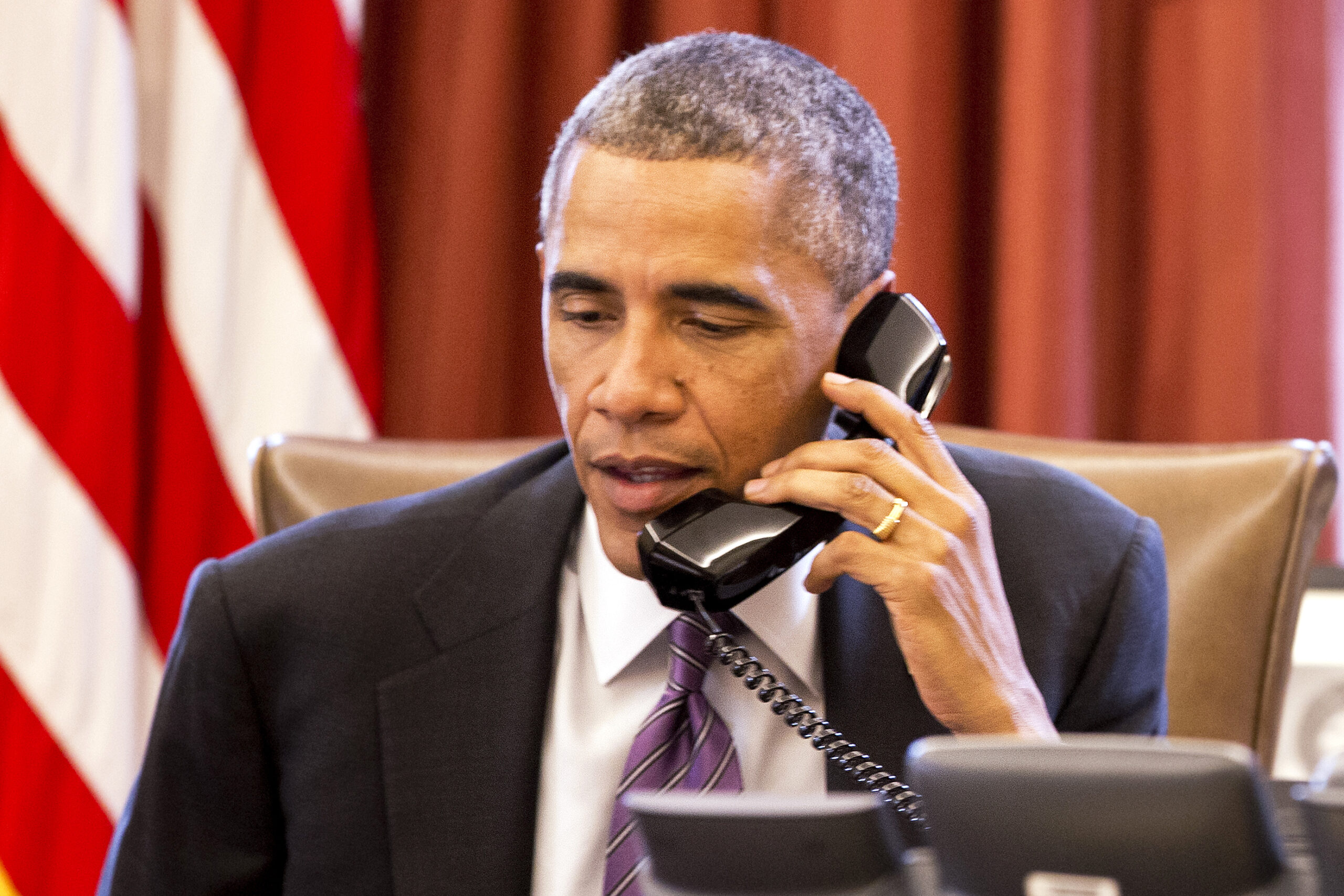Obama working phones to build support for spending bill