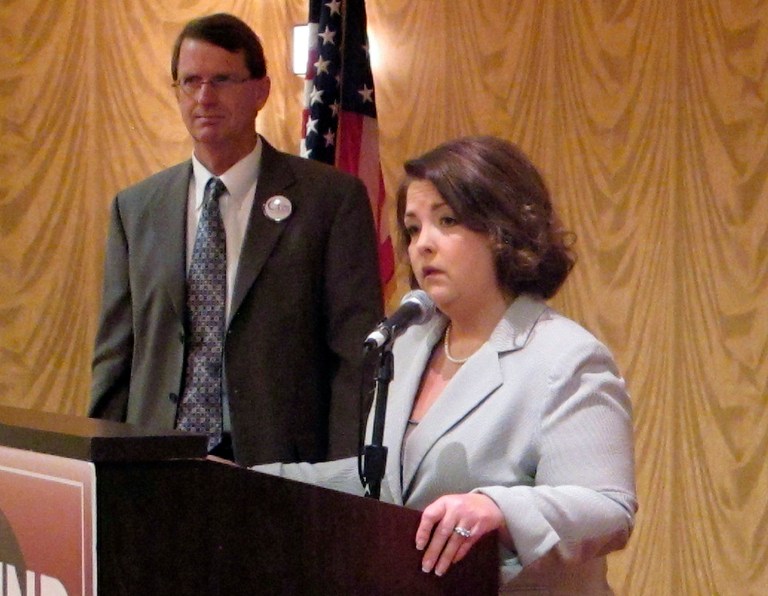 FILE - In this Aug. 29, 2013, file photo, Tea Party Express Chairwoman Amy Kremer, speaks in Charleston, S.C.,, businessman Richard Cash listens. Cash is running against Sen. Lindsey Graham, R-S.C., in next year's South Carolina GOP Senate primary. ea party activists helped fuel RepublicansÃ? gains in the 2010 elections. But now theyÃ?re criticizing Republican leaders seemingly at every turn. That puts GOP leaders on Capitol Hill in a tight spot, particularly on how to handle upcoming budget negotiations.(AP Photo/Bruce Smith, File)