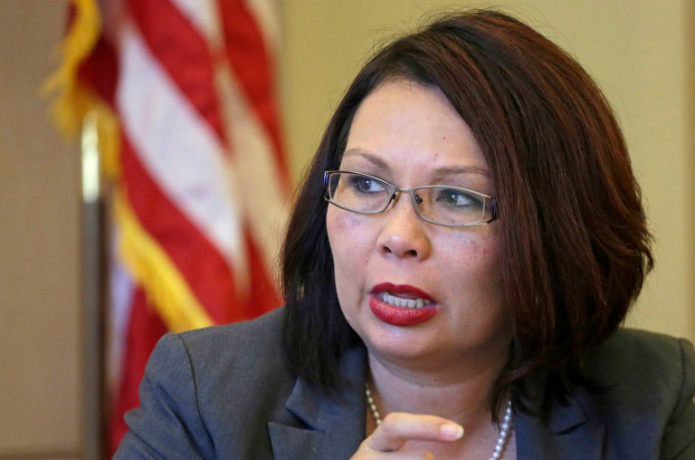 Rep. Tammy Duckworth's position on how to address the Syrian refugee crisis became a flashpoint in the Illinois Senate race this summer after her Republican rival, Sen. Mark Kirk, began running a television ad that attacked her for supposedly supporting the acceptance of 200,000 Syrians. (AP Photo/M. Spencer Green, File)
