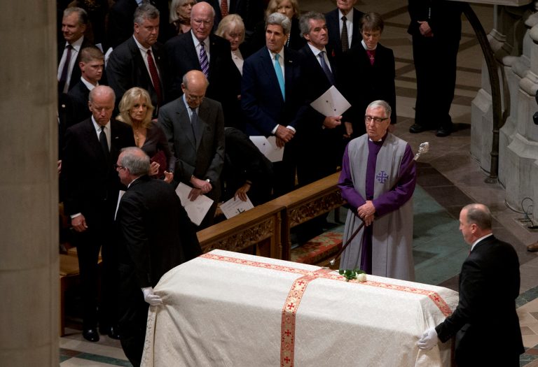 The casket is moved for the recessional at the conclusion of a funeral service for Ben Bradlee, former managing editor and executive editor of The Washington Post, Wednesday, Oct. 29, 2014, at the Washington National Cathedral in Washington. (AP Photo/Carolyn Kaster)