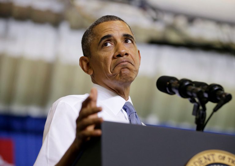 President Barack Obama pauses while speaking about the Affordable Care Act, Thursday, Sept. 26, 2013, at Prince George's Community College in Largo, Md.