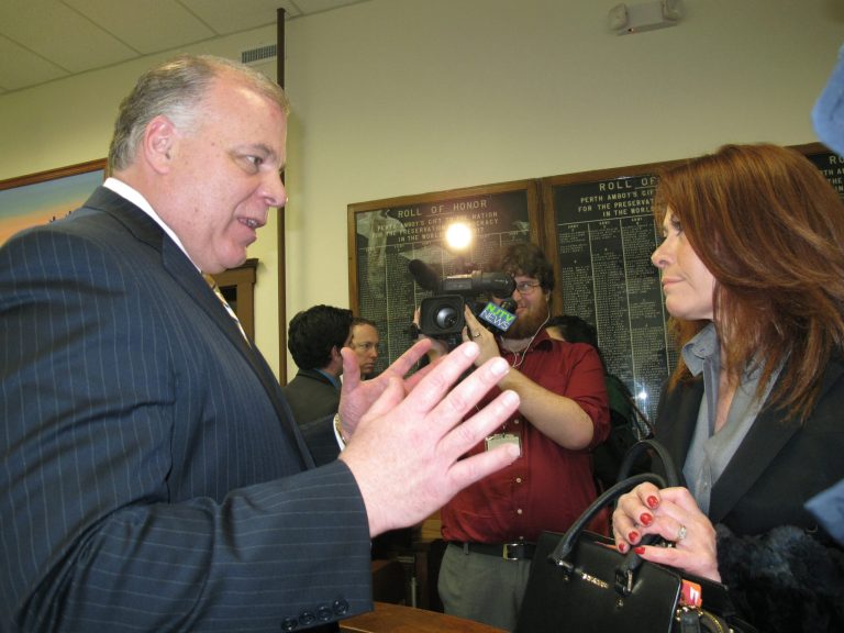 New Jersey state Senate President Steve Sweeney, left, speaks with Yvonne Lopez, right, an official with the Puerto Rican Association for Human Development following a press conference in Perth Amboy N.J. on Feb. 19, 2014. Sweeney was pushing for his proposed 