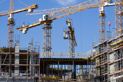 Cranes on a construction site.