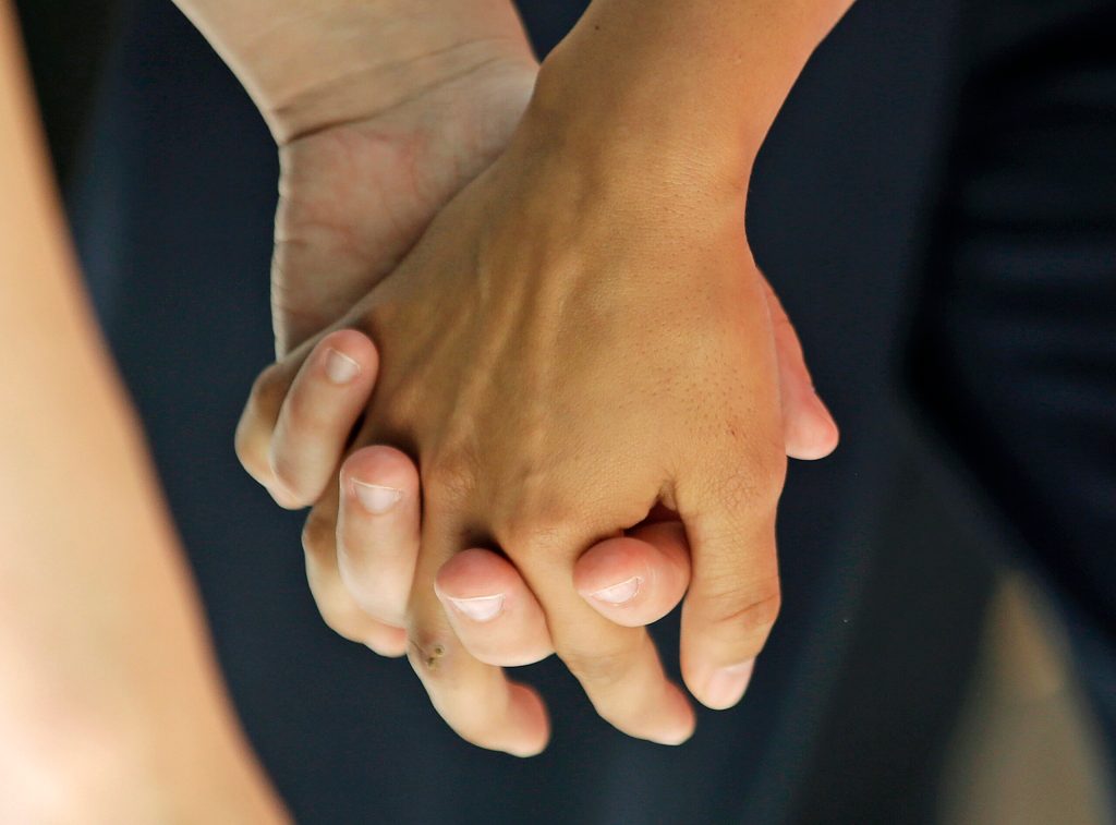 Employee sues Walmart over same-sex benefits