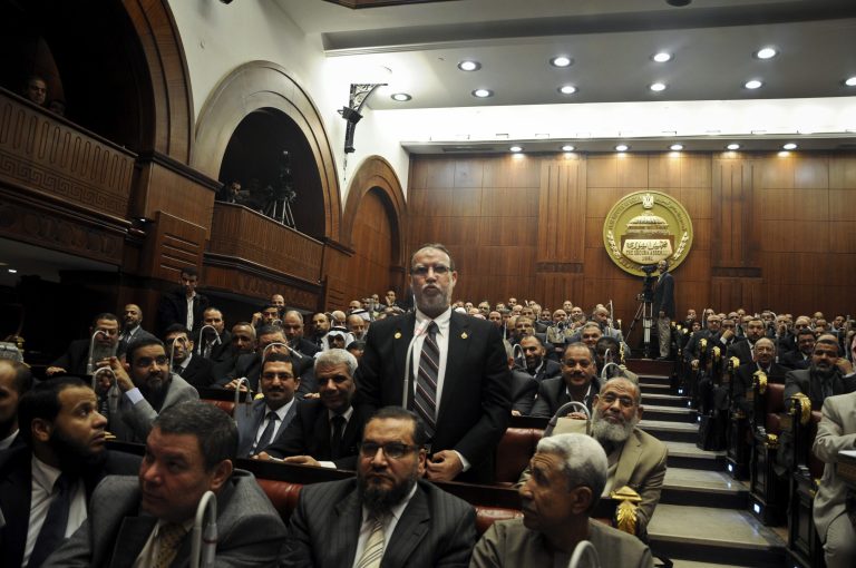   Essam el-Erian vice chairman of the Freedom And Justice party, speaks during a session at the Shura Council building in Cairo, Egypt, Wednesday, Dec. 26, 2012. The official approval of Egypt's disputed, Islamist-backed constitution Tuesday held out little hope of stabilizing the country after two years of turmoil and Islamist President Mohammed Morsi may now face a more immediate crisis with the economy falling deeper into distress. (AP Photo/Mohammed Asad)  