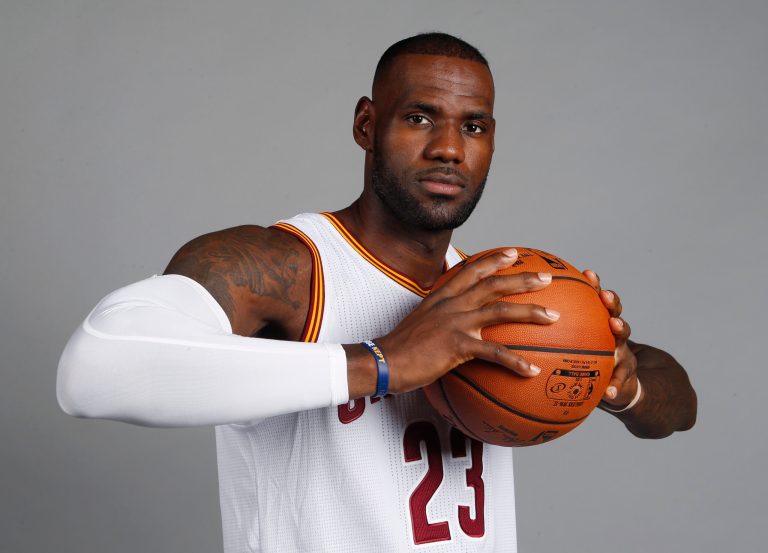 Supporters of one party don't reconsider their politics if a celebrity endorses someone of the opposite party; they like the celebrity less. LeBron James might be learning this lesson soon. (AP Photo)