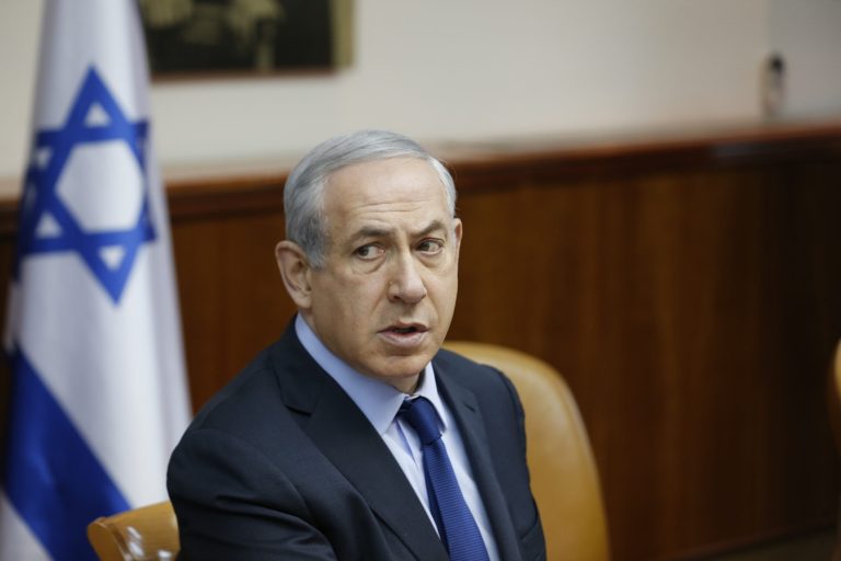 The Israeli prime minister says he didn't claim his predecessor's assassination allowed him to die a hero. (Baz Ratner/Pool Photo via AP)