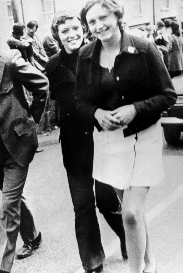 FILE - In this file photo dated June 4, 1972 Dolours Price, left, and her sister Marian attend a civil rights demonstration in Belfast, Northern Ireland. Police say Thursday Jan. 24, 2013, Dolours Price, a veteran Irish Republican Army member at the center of allegations against Sinn Fein leader Gerry Adams has been found dead at her home. Dolours Price had alleged that Adams was her IRA commander in Belfast in the early 1970s and was involved in ordering several Catholic civilians to be abducted, executed and buried in secret. (AP Photo, File)