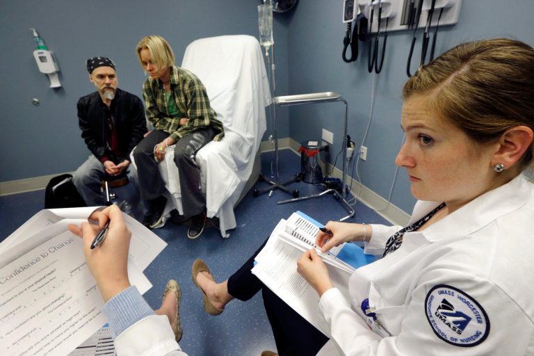 University of Massachusetts Medical School nursing student Morgan Brescia, right, and others attend a simulation of treatment for a patient coping with addiction during class at the medical school in Worcester, Mass. (AP Photo/Elise Amendola)