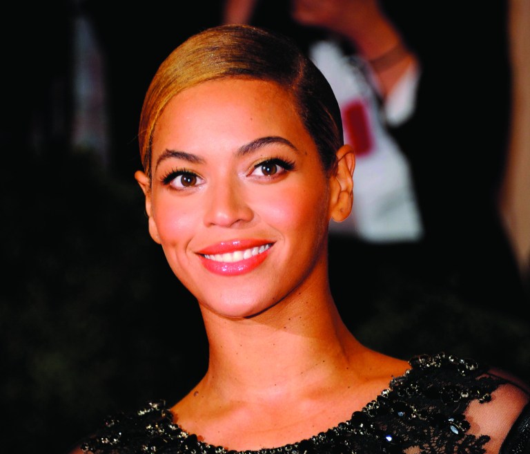 FILE - This May 7, 2012 file photo shows Beyonce Knowles at the Metropolitan Museum of Art Costume Institute gala benefit in New York. Beyonce will sing the national anthem at President Barack Obama's inauguration ceremony. The committee planning the Jan. 21 event also announced Wednesday that Kelly Clarkson will perform 