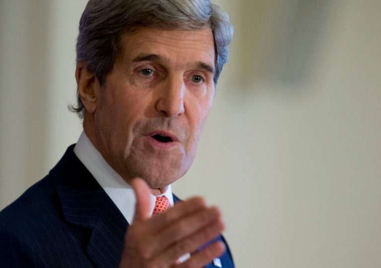 Secretary of State John Kerry gestures as he speaks at the Organization of American States (OAS) in Washington, Monday, Nov. 18, 2013, during and event co-hosted by the OAS and Inter-American Dialogue focusing on U.S. policy of partnership and engagement with the Western Hemisphere. (AP Photo/Carolyn Kaster)