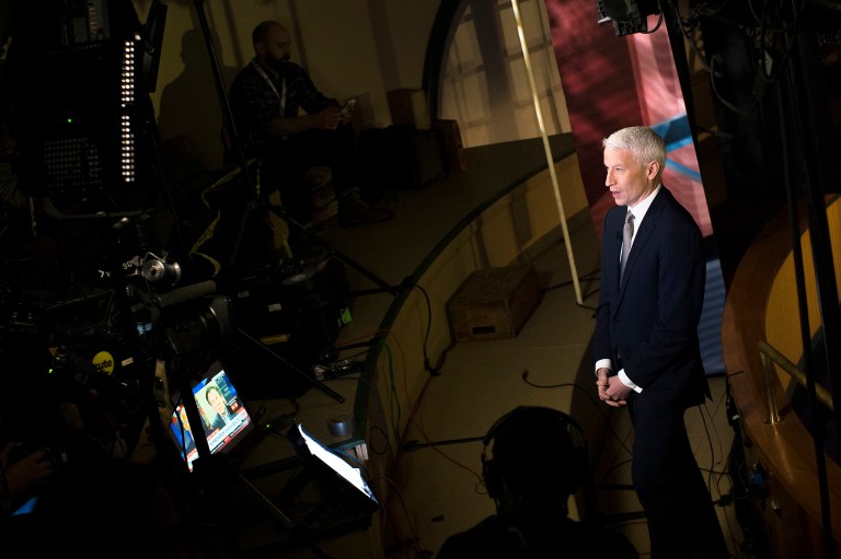 CNN's Anderson Cooper is not the only member of the press to put this theory into practice. (AP Photo/John Minchillo)