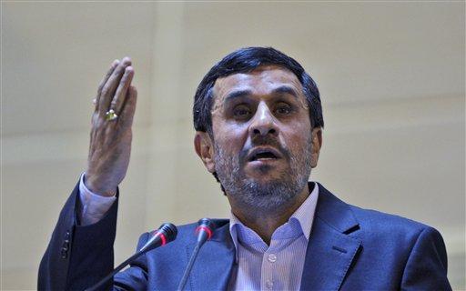Iranian President Mahmoud Ahmadinejad, gestures, as he delivers a speech during 