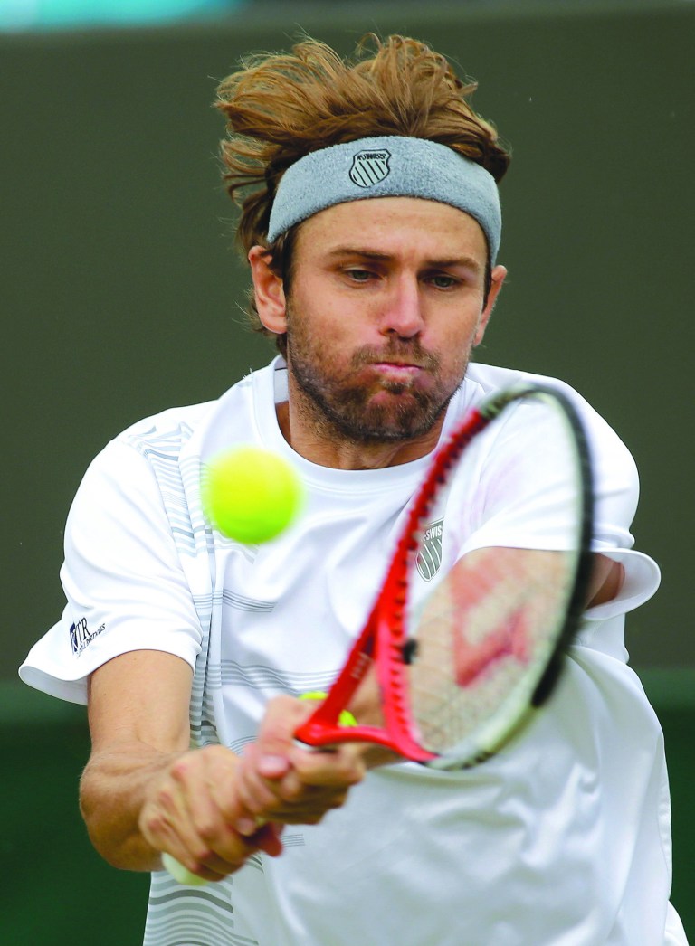 Sang Tan/AP
Mardy Fish