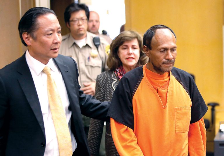 Francisco Sanchez, right, is lead into the courtroom by San Francisco Public Defender Jeff Adachi, left, and Assistant District Attorney Diana Garciaor, center, for his arraignment at the Hall of Justice on Tuesday, July 7, 2015 in San Francisco. Prosecutors have charged the Mexican immigrant with murder in the waterfront shooting death of 32-year-old Kathryn Steinle. (Michael Macor/San Francisco Chronicle via AP, Pool)