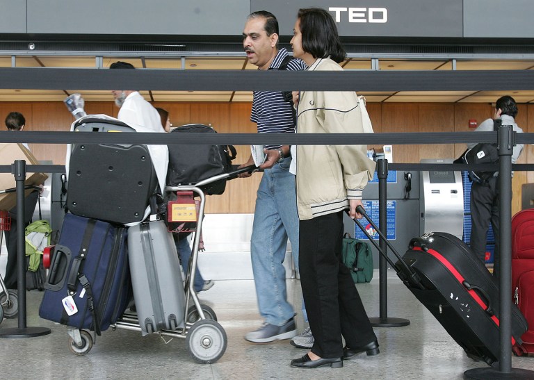 Some Democrats suggested checked-bag fees are leading to heavy use of carry-on baggage that are bogging down security checkpoints. (Examiner File)