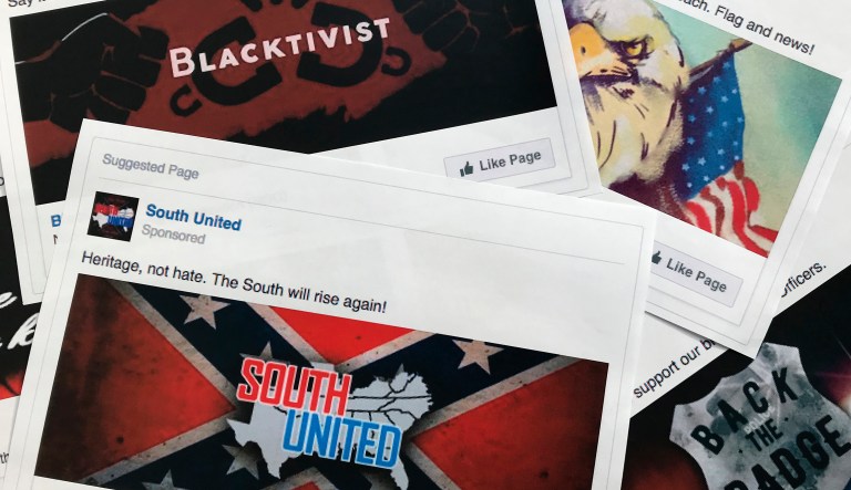 Some of the Facebook ads linked to a Russian effort to disrupt the American political process and stir up tensions around divisive social issues, released by members of the U.S. House Intelligence committee, are photographed in Washington, on Wednesday, Nov. 1, 2017. The ads, dozens of which were disclosed for the first time, were released as representatives of leading social media companies faced criticism on Capitol Hill about why they hadn't done more to combat Russian interference on their sites and prevent foreign agents from meddling in last year's election.