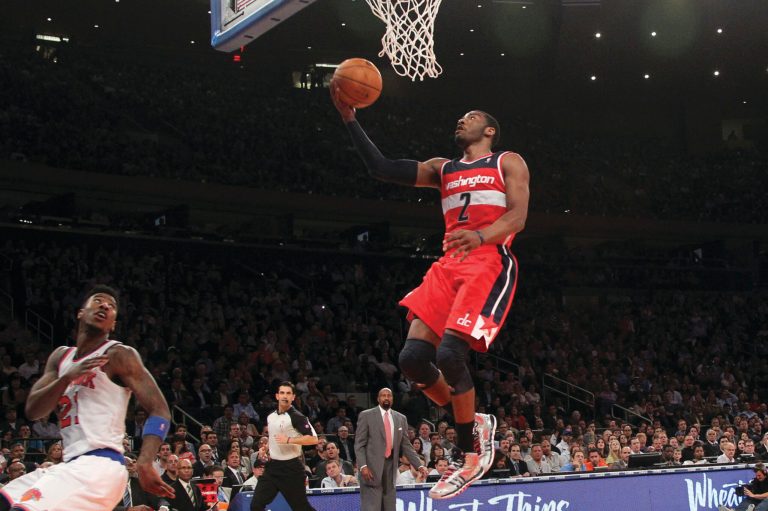 Mary Altaffer/AP
Wizards guard John Wall scored 33 points in Washington's 120-99 loss to the Knicks on Tuesday.