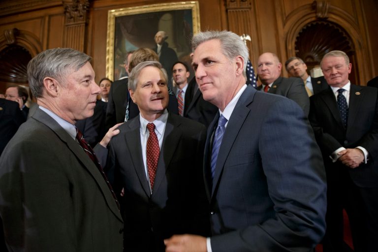 From left, House Energy and Commerce Committee Chairman Fred Upton, R-Mich., Sen. John Hoeven, R-N.D., sponsor of the Senate's Keystone XL pipeline bill version, and House Majority Leader Kevin McCarthy, R-Calif., gather with other lawmakers to urge President Barack Obama to sign the legislation passed in the House and Senate approving expansion of the Keystone XL pipeline, at the Capitol in Washington, Wednesday, Feb. 11, 2015. (AP Photo/J. Scott Applewhite)