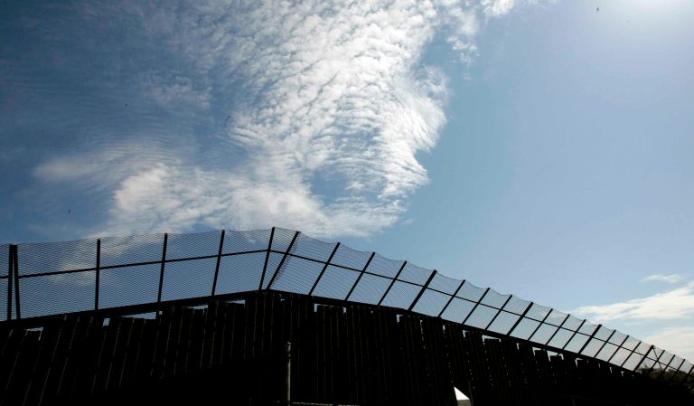 A stretch of the metal wall that divides Nogales, Mexico with Nogales, Ariz., is seen from the Mexican side. (AP Photo/Gregory Bull)