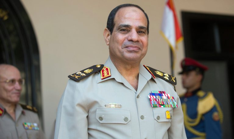 Egyptian First Deputy Prime Minister Vice and Minister of Defense, General Abdel Fattah al-Sisi stands in the Defense Ministry in Cairo. (Michael Kappeler/AP Images)
