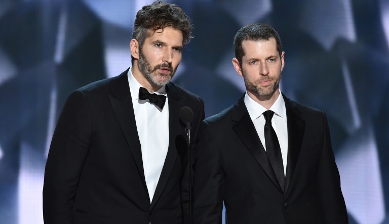 David Benioff, left, and D.B Weiss accept the award for outstanding writing for a drama series for 