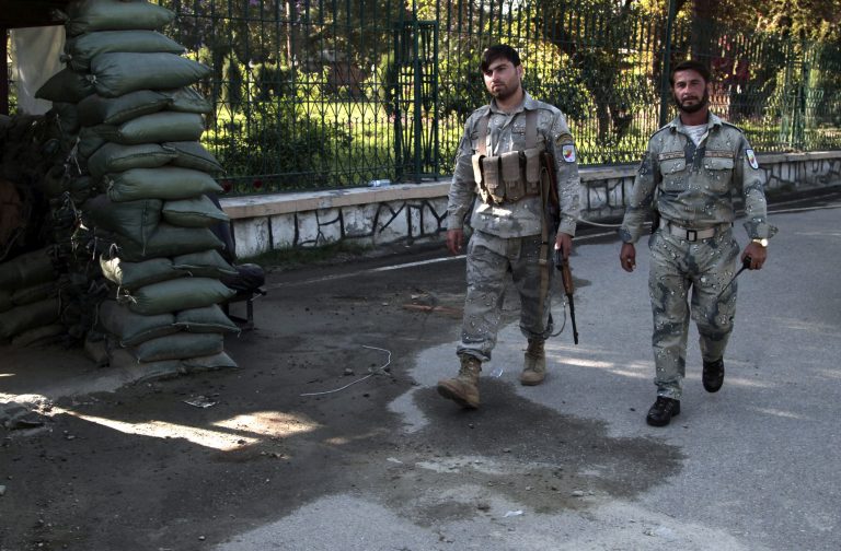 Afghan policemen patrol at the site of a deadly attack by an Afghan national army soldier who opened fire on U.S. troops, in the compound of the provincial governor, Jalalabad, Afghanistan, Wednesday, April 8, 2015. A U.S. official said an American soldier was killed in the shooting incident in the eastern Afghan city of Jalalabad in which at least two other U.S. troops were wounded when an Afghan soldier opened fire at them. (AP Photo/Rahmat Gul)