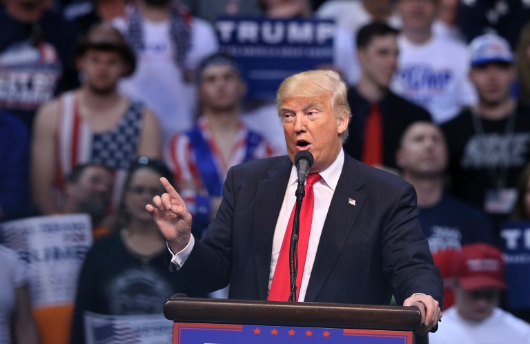 Under the most optimistic scenario, Donald Trump will be close enough to 1,237 delegates that he can become the nominee if he can persuade a sufficient number of the other unbound delegates who don't already support him. (AP Photo/Mel Evans)