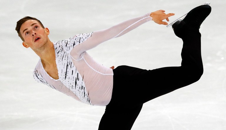 Adam Rippon will be the first openly gay figure skater to compete on Team USA when he arrives at the Olympics in Pyeongchang, South Korea, next month. (AP Photo/Francois Mori)