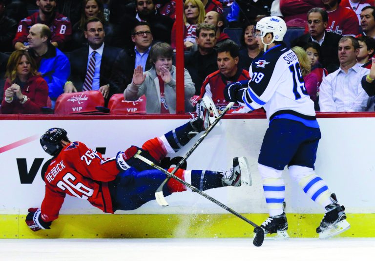Alex Brandon/AP
Washington Capitals center Matt Hendricks scored the first goal of the game off his skate and won two fights Tuesday night against the Winnipeg Jets.